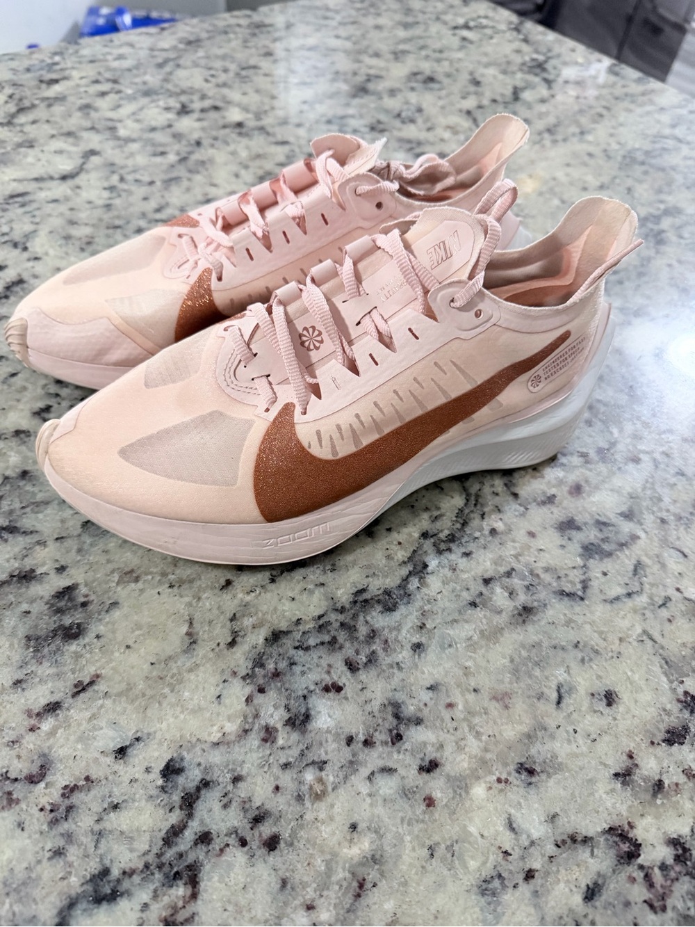 Nike Women’s Blush Pink Running Shoes with Copper Swoosh